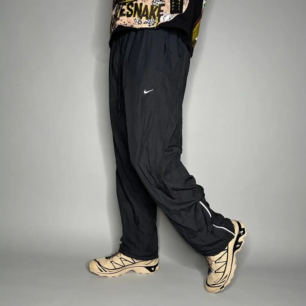 Nike Track Pants Black Polyester Sweatpants White Swoosh Ankle Zippers to Flare